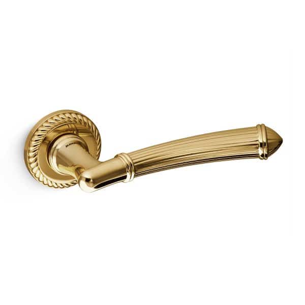 polished brass lever handle on round rose mandelli